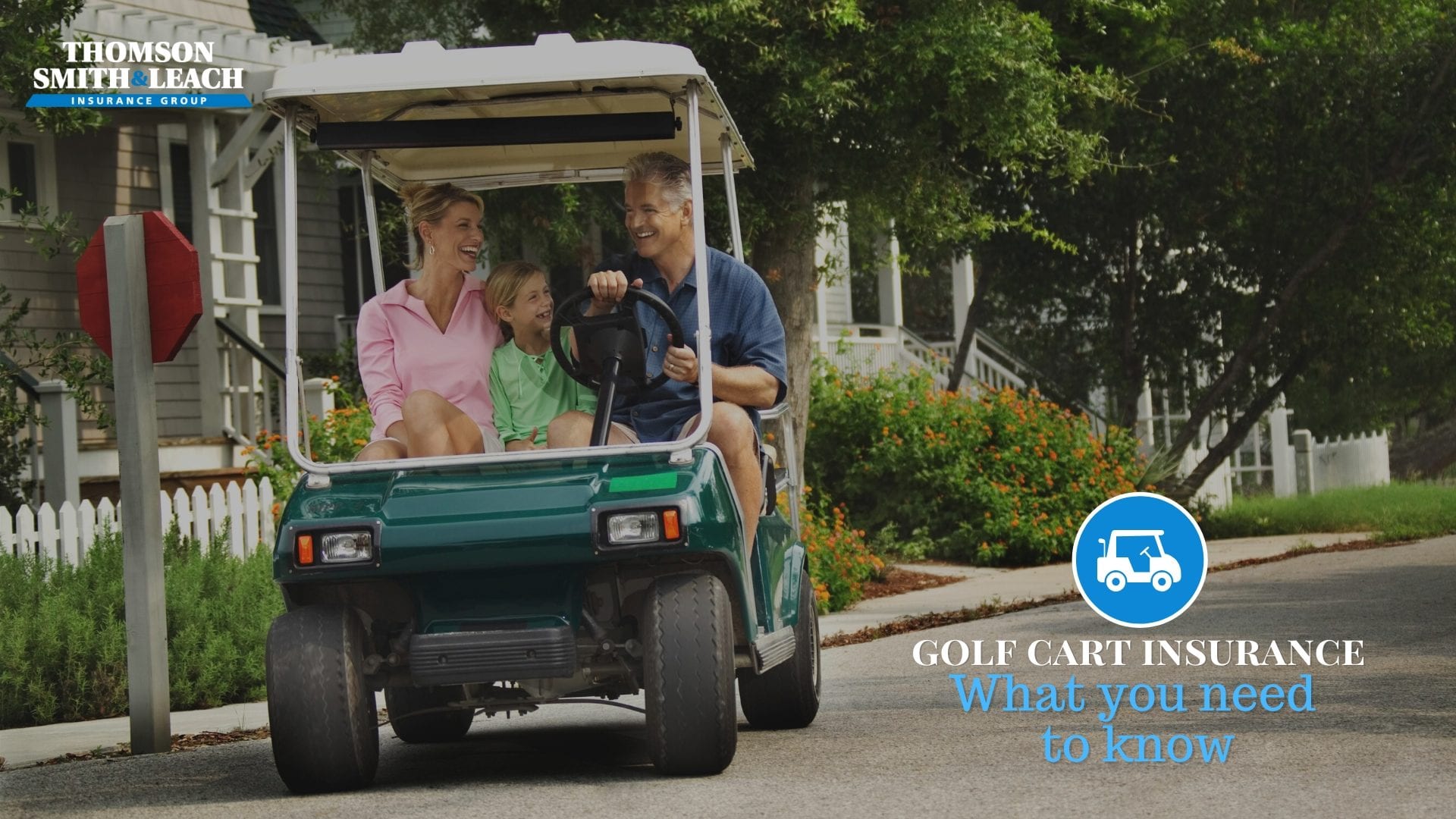 family riding in a golf cart in the neighborhood